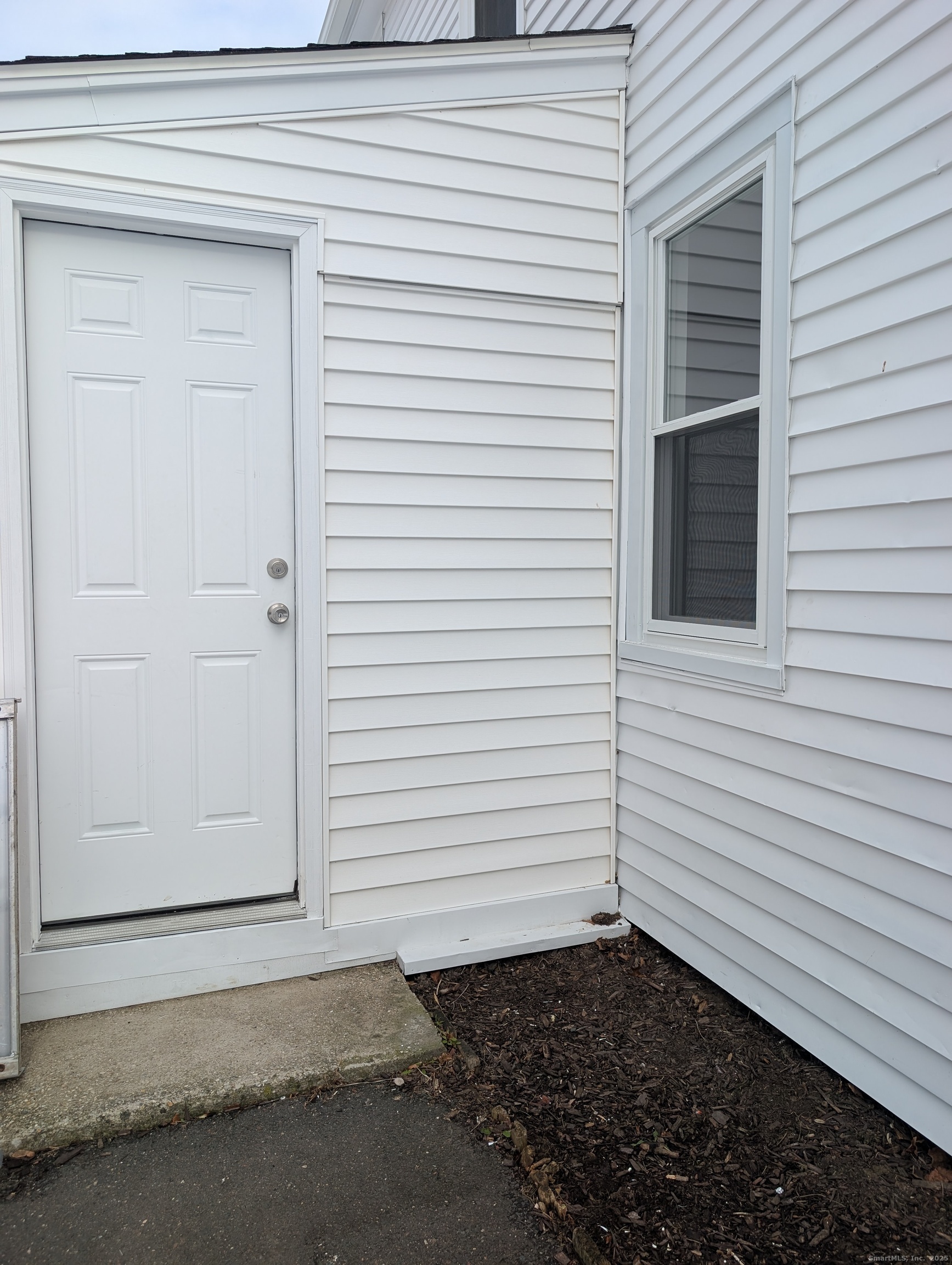 86 Main Street, Unit A East Windsor, CT 06016 - Photo 13 of 17 a white house with a sink
