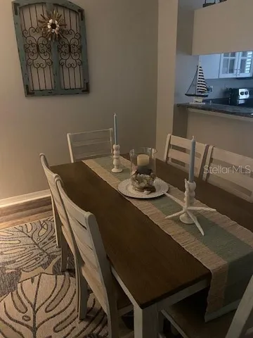 a view of a dining room with furniture