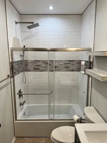 a bathroom with a sink and bathtub