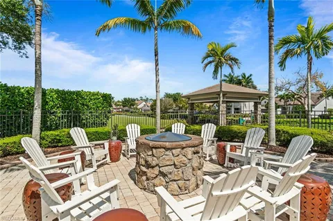 a view of a patio with a table chairs and a patio