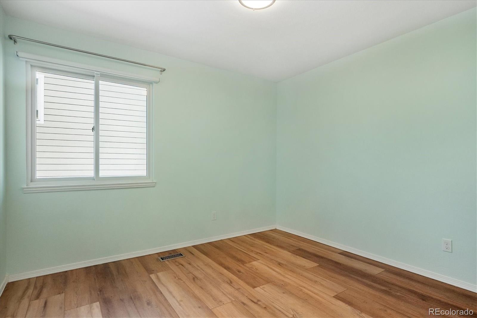 9377 Newport Lane Highlands Ranch, CO 80130 - Photo 13 of 26 an empty room with a window
