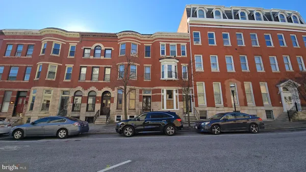 a car parked in front of a building