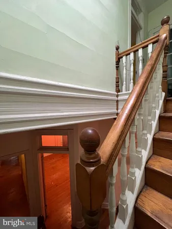 a view of a livingroom with a staircase
