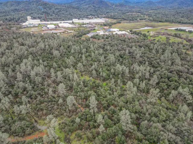 a view of a field with an outdoor space