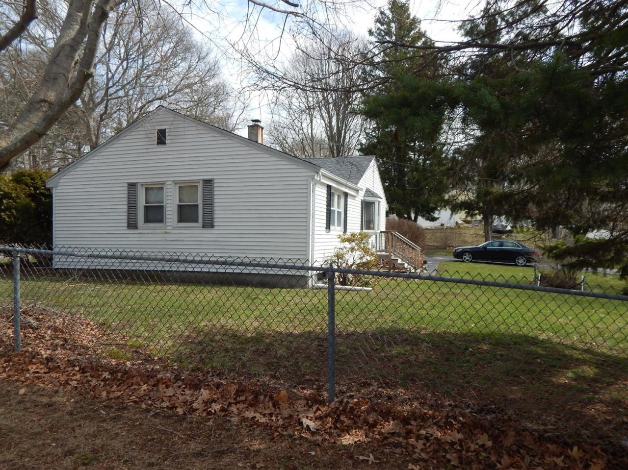 19 Millbrook Road Bourne, MA 02532 - Photo 2 of 7 a view of a house with a yard