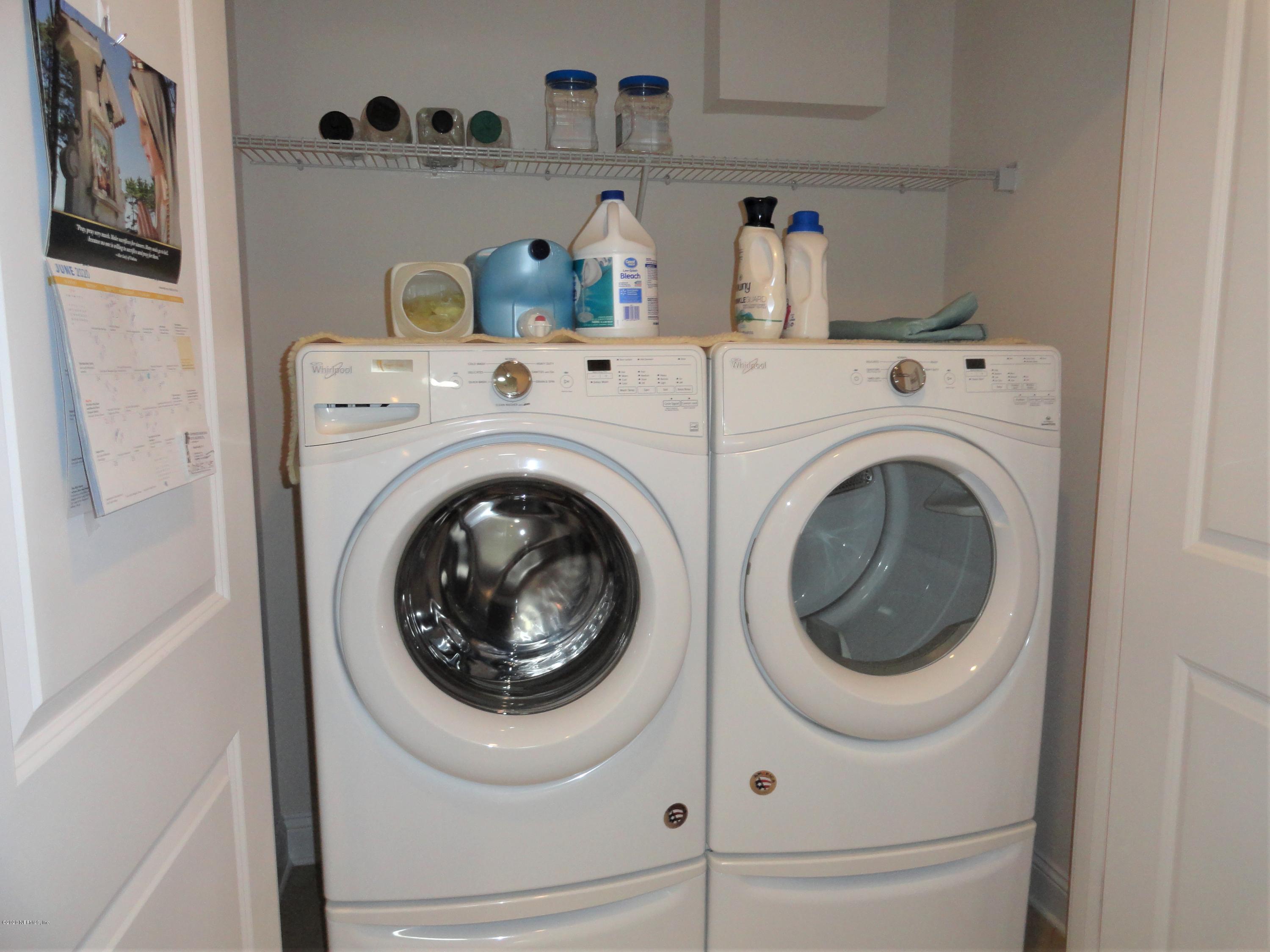 33 Utina Way St. Augustine, FL 32084 - Photo 12 of 30 a utility room with dryer and washer
