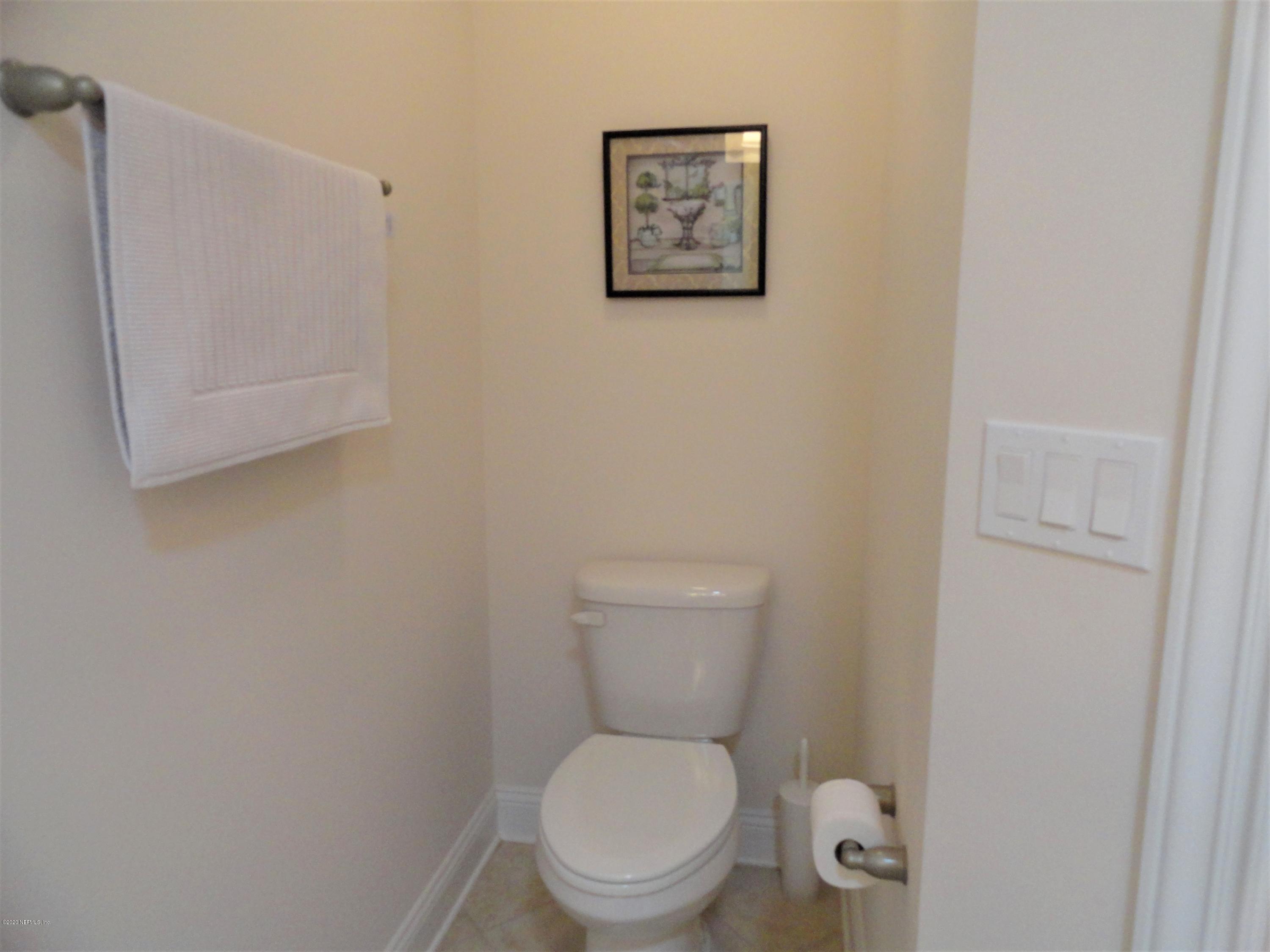 33 Utina Way St. Augustine, FL 32084 - Photo 20 of 30 a white toilet sitting next to a white wall