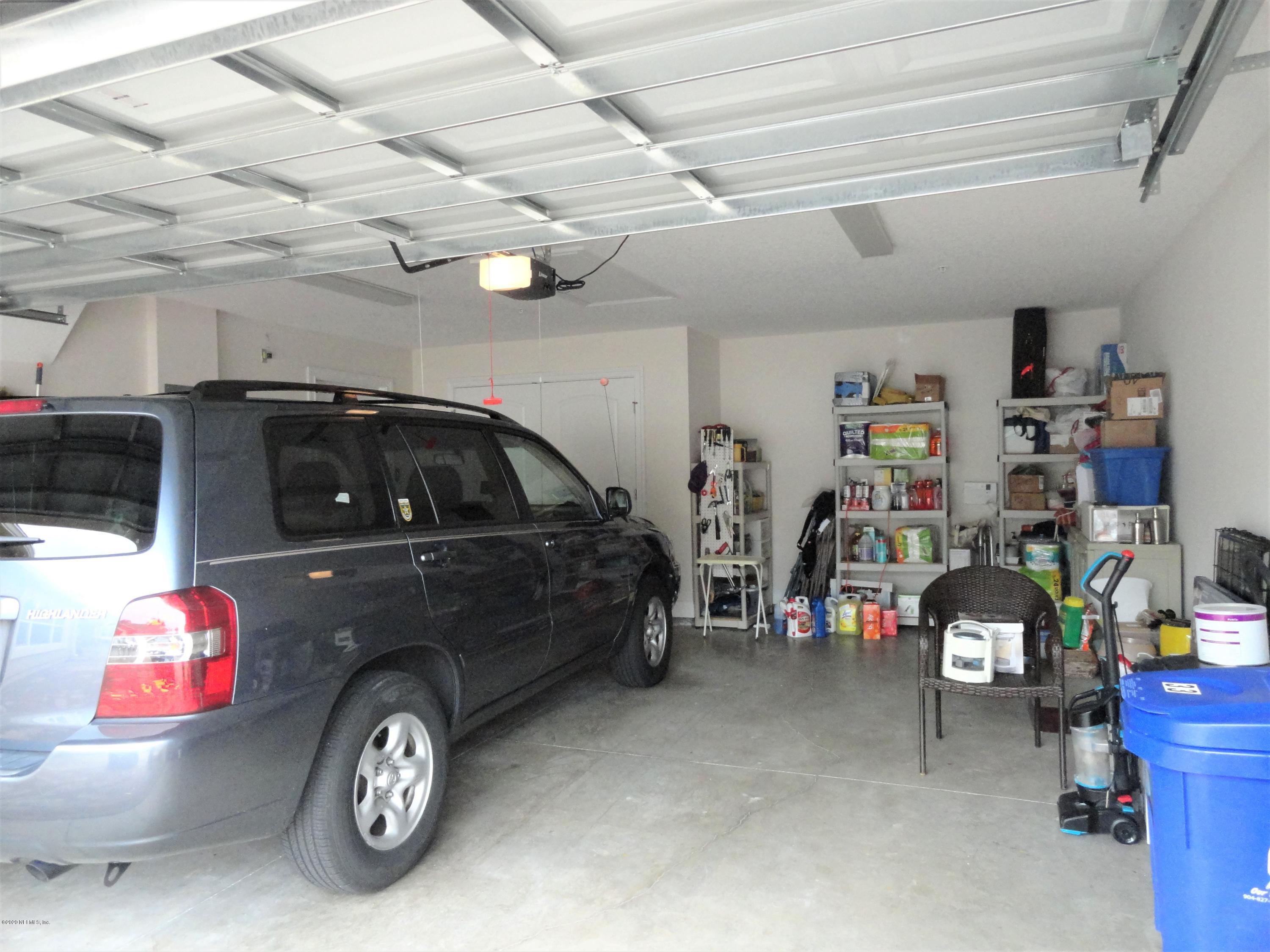 33 Utina Way St. Augustine, FL 32084 - Photo 24 of 30 a car parked in a garage