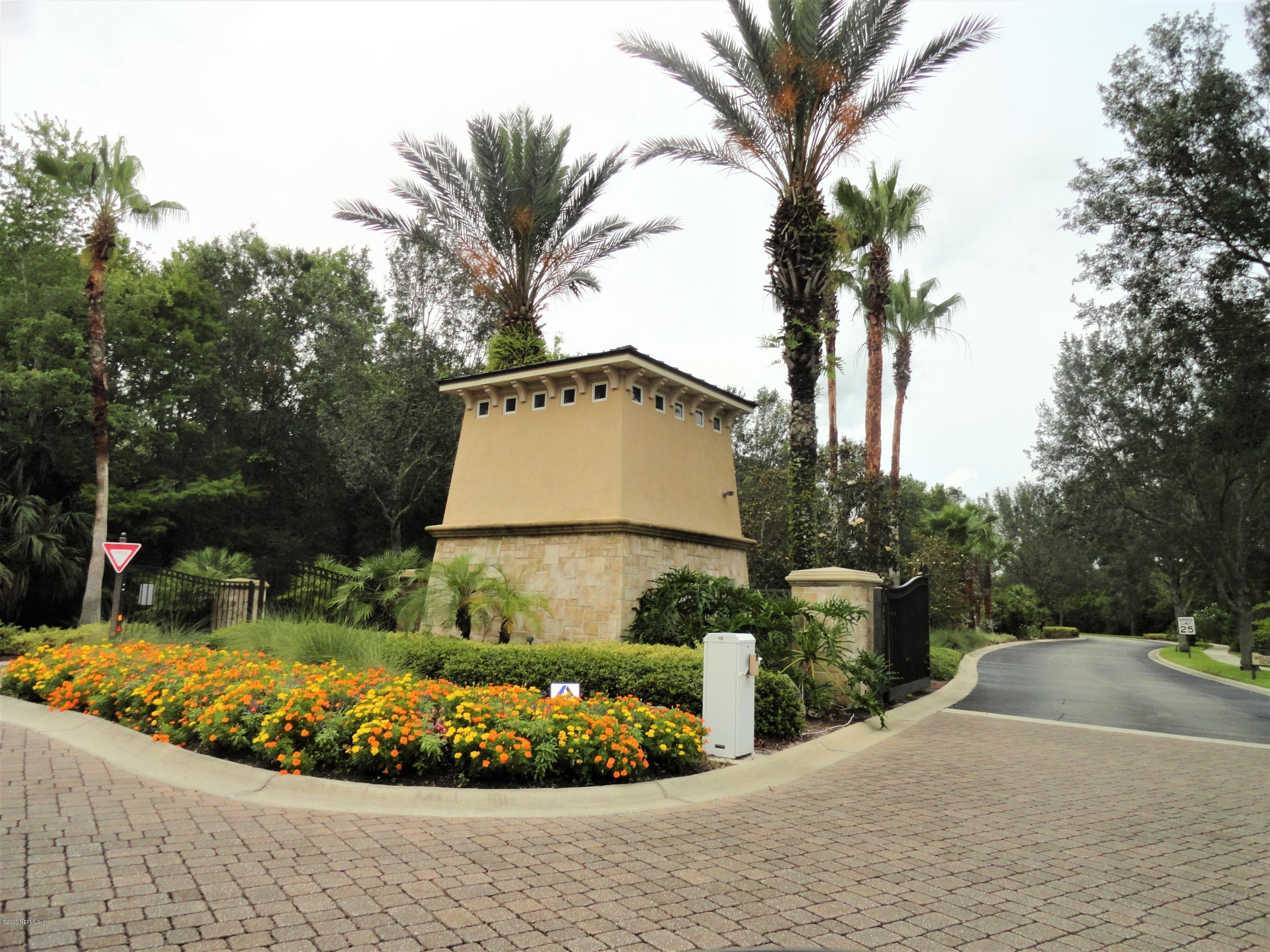 33 Utina Way St. Augustine, FL 32084 - Photo 25 of 30 a view of a backyard with plants and palm tree