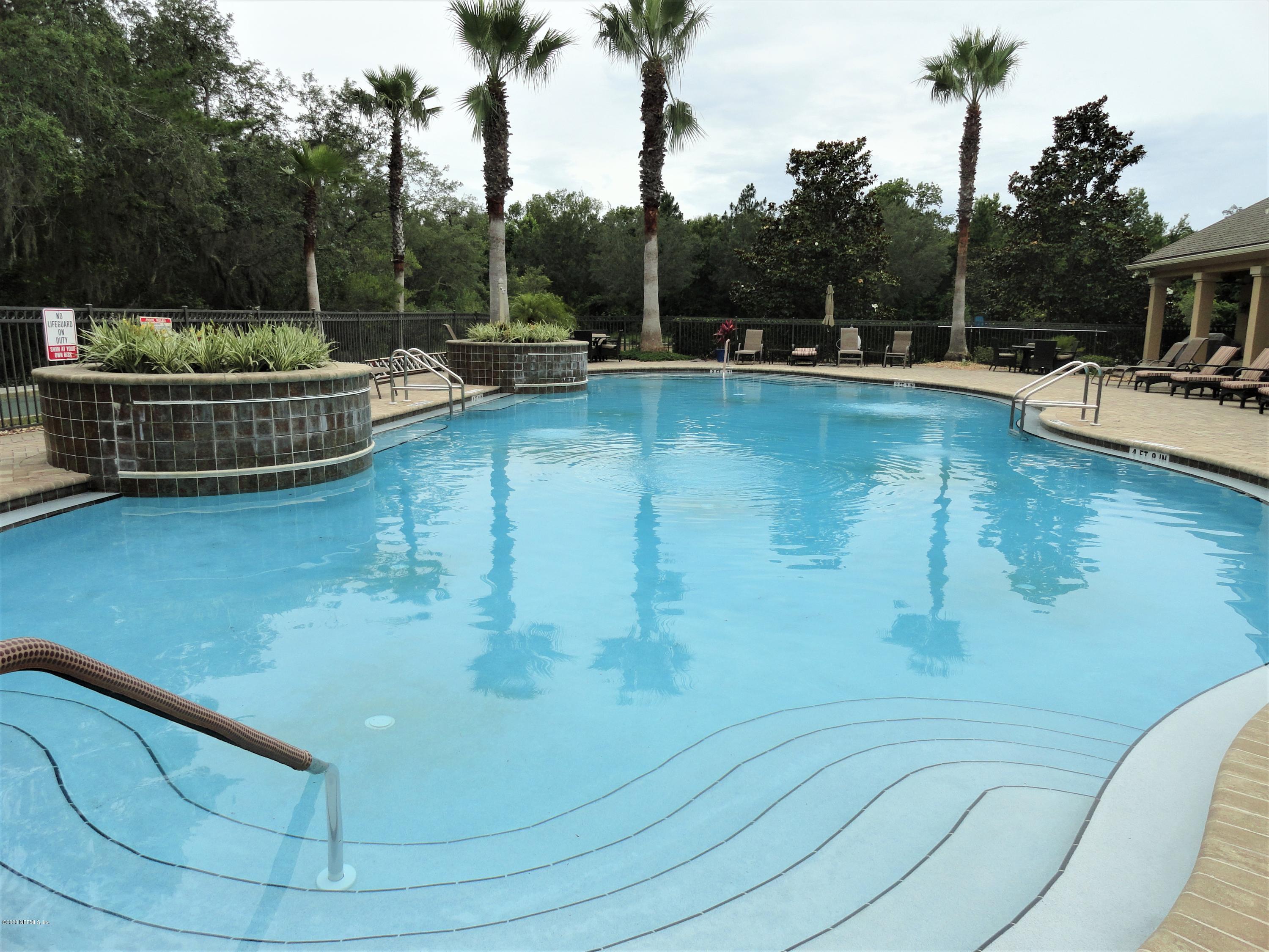 33 Utina Way St. Augustine, FL 32084 - Photo 30 of 30 a view of a swimming pool with a patio