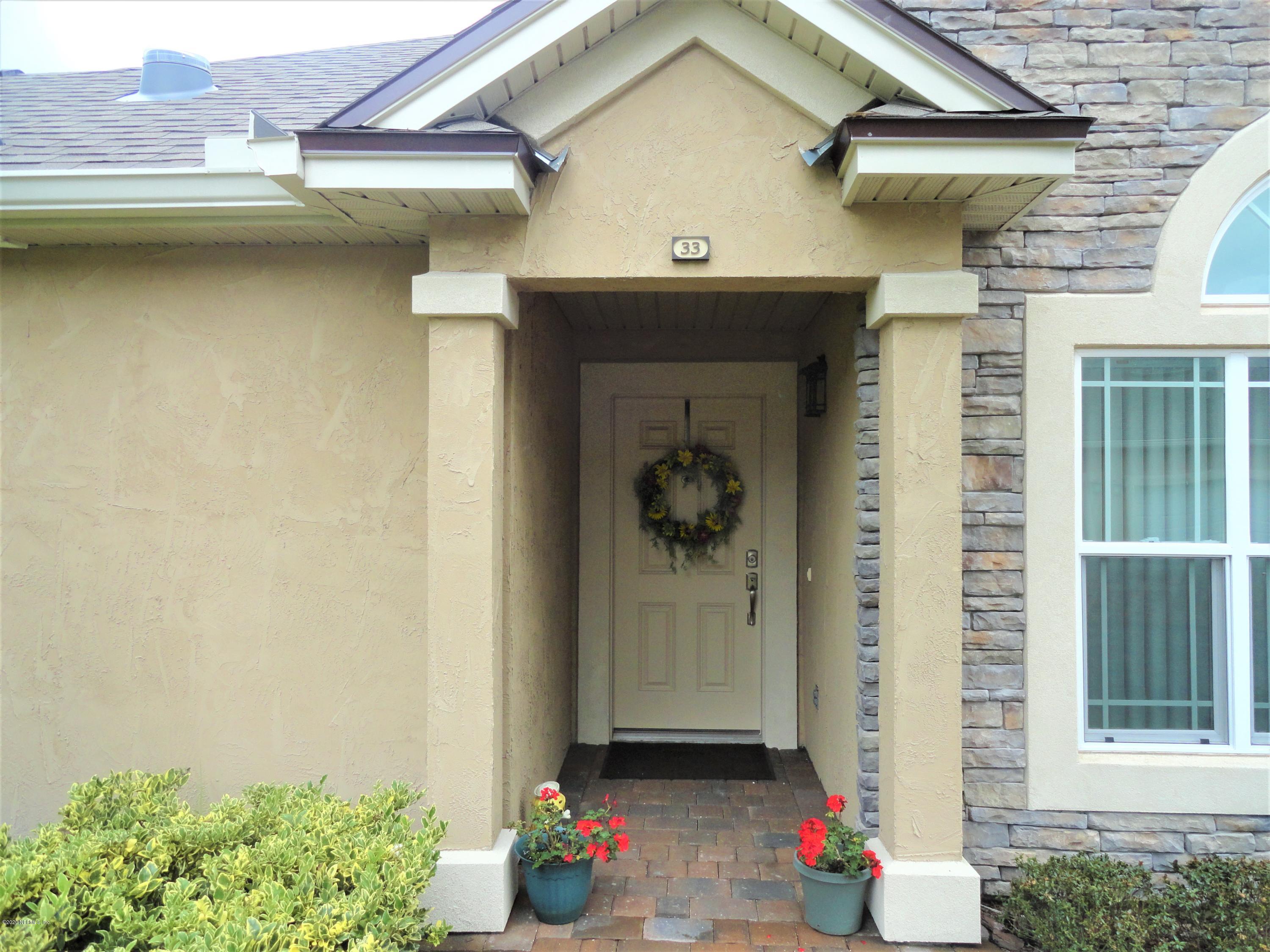 33 Utina Way St. Augustine, FL 32084 - Photo 3 of 30 a front view of a house with an outdoor space