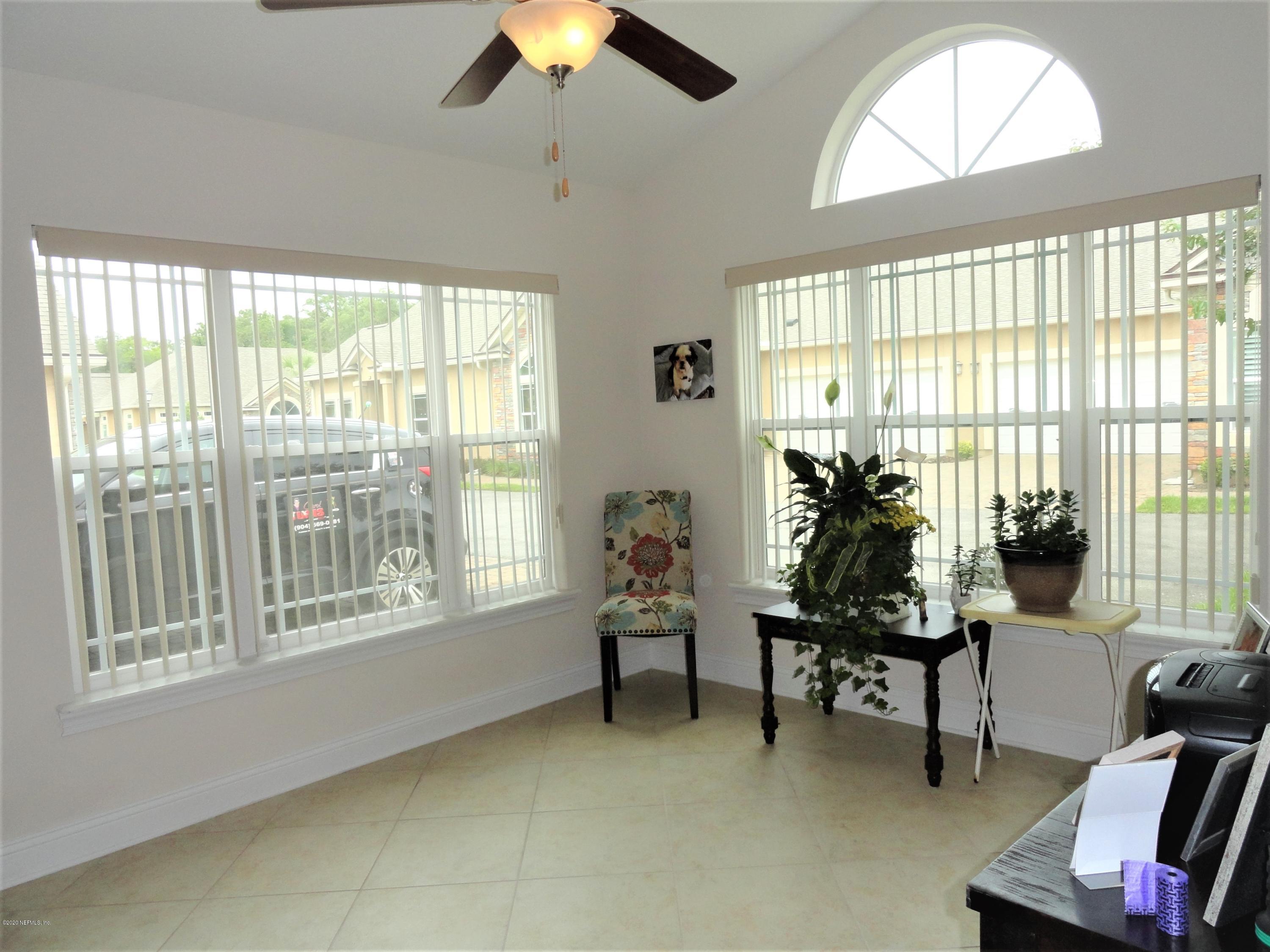 33 Utina Way St. Augustine, FL 32084 - Photo 7 of 30 a living room with furniture and a flat screen tv