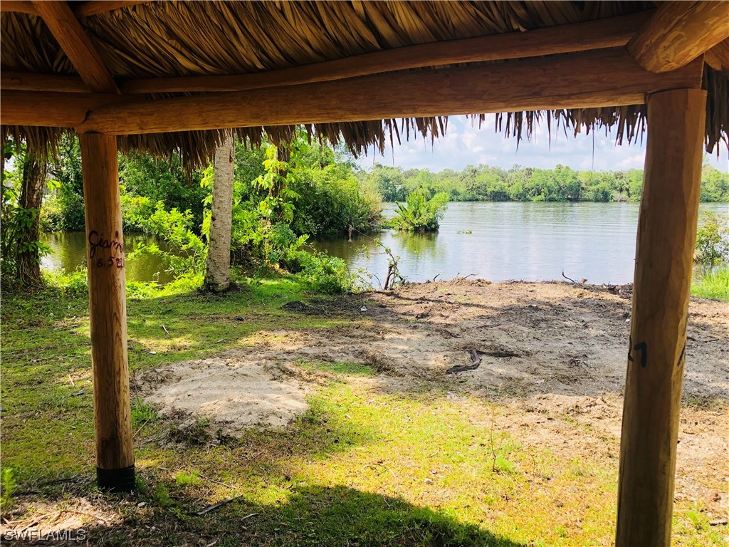 17720 Caloosa Road Alva, FL 33920 - Photo 4 of 7 a lake view with a lake view