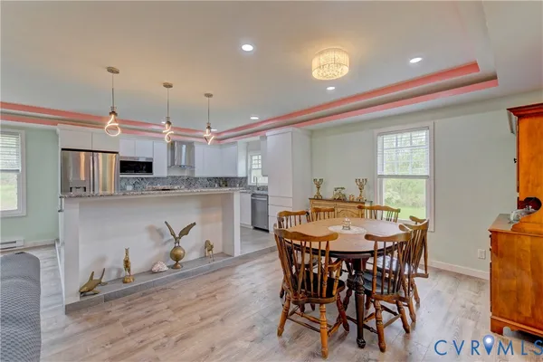 a view of a dining room with furniture