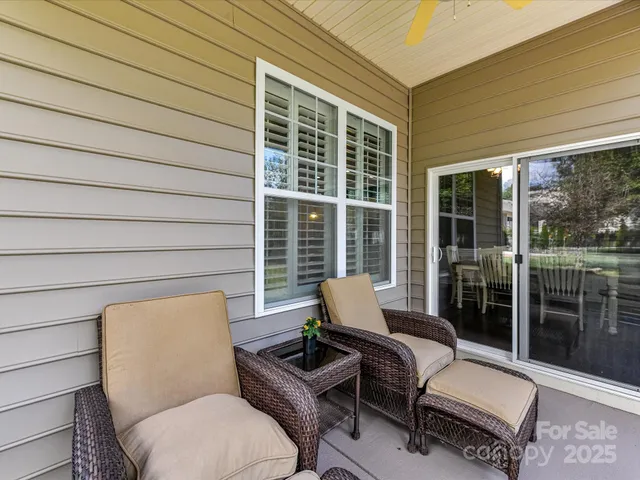 a view of a two chairs in the deck