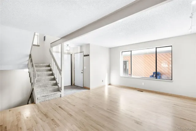 a view of staircase with white walls and white walls