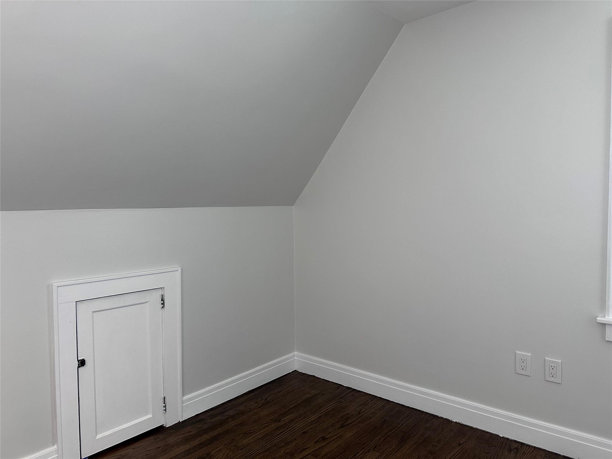 39 Adams Street, Unit 2 Poughkeepsie, NY 12601 - Photo 7 of 12 a view of an empty room with wooden floor