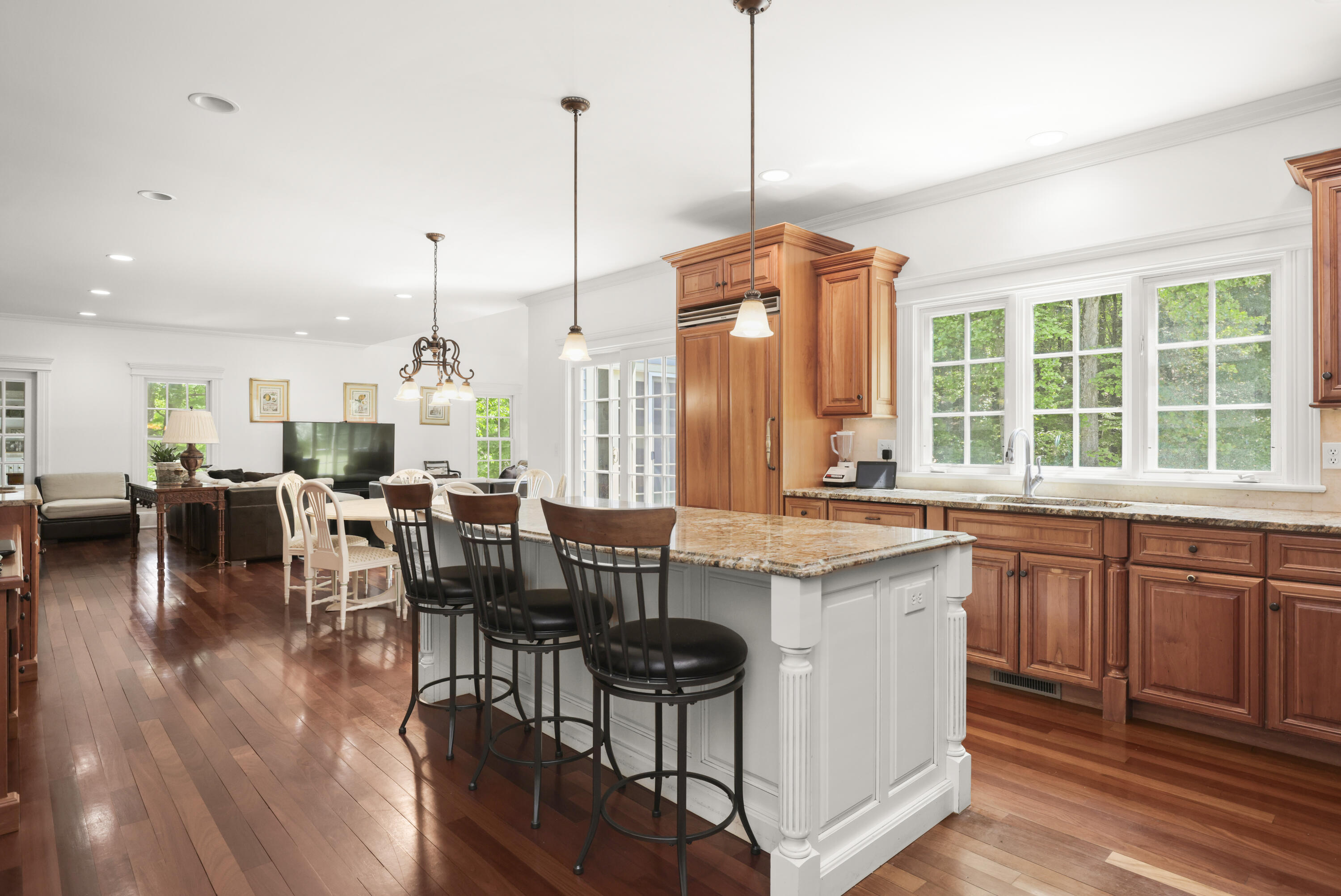 218 Limestone Road Ridgefield, CT 06877 - Photo 12 of 41 a kitchen with lots of counter space dining table and chairs