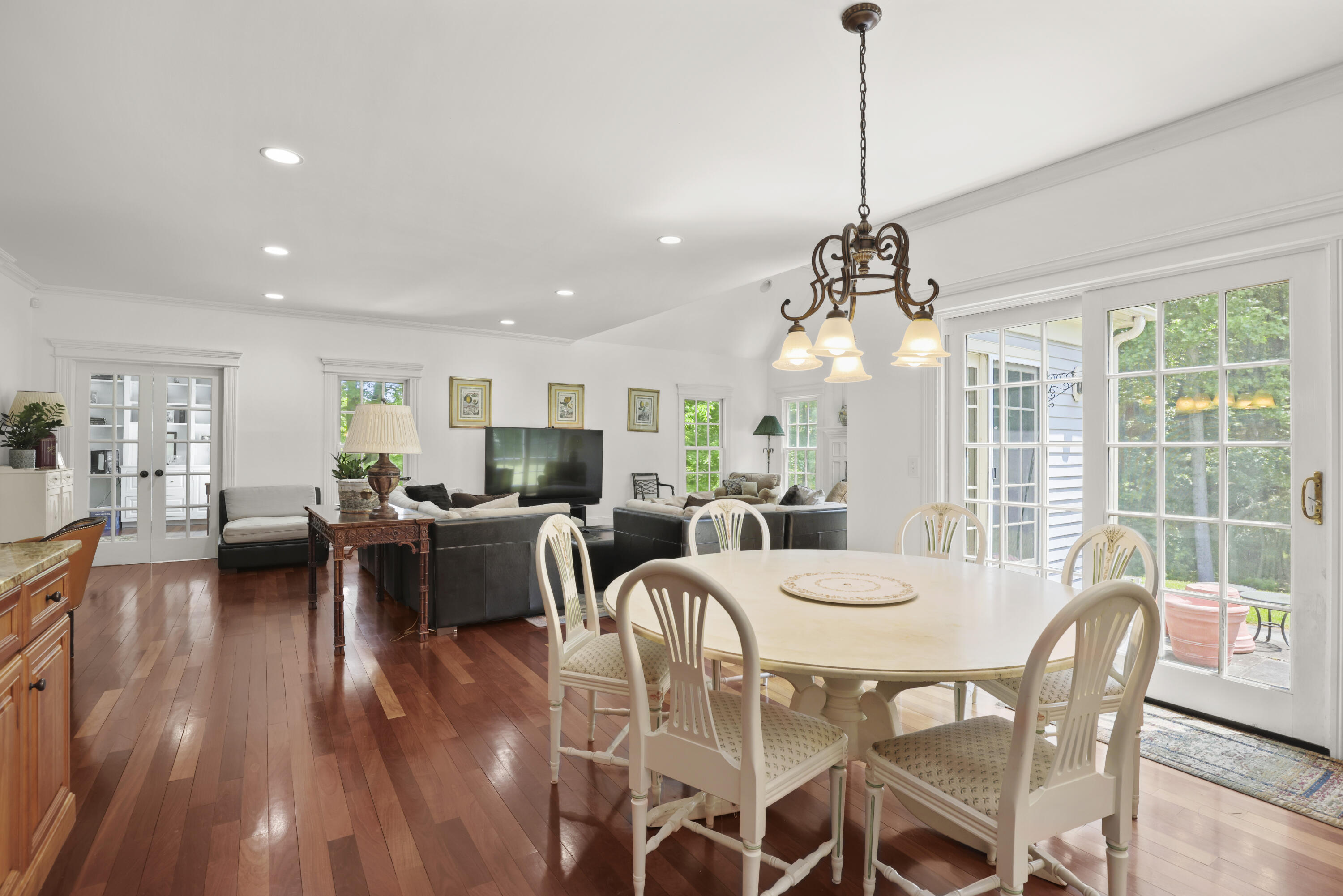 218 Limestone Road Ridgefield, CT 06877 - Photo 14 of 41 a view of a dining room with furniture window and wooden floor