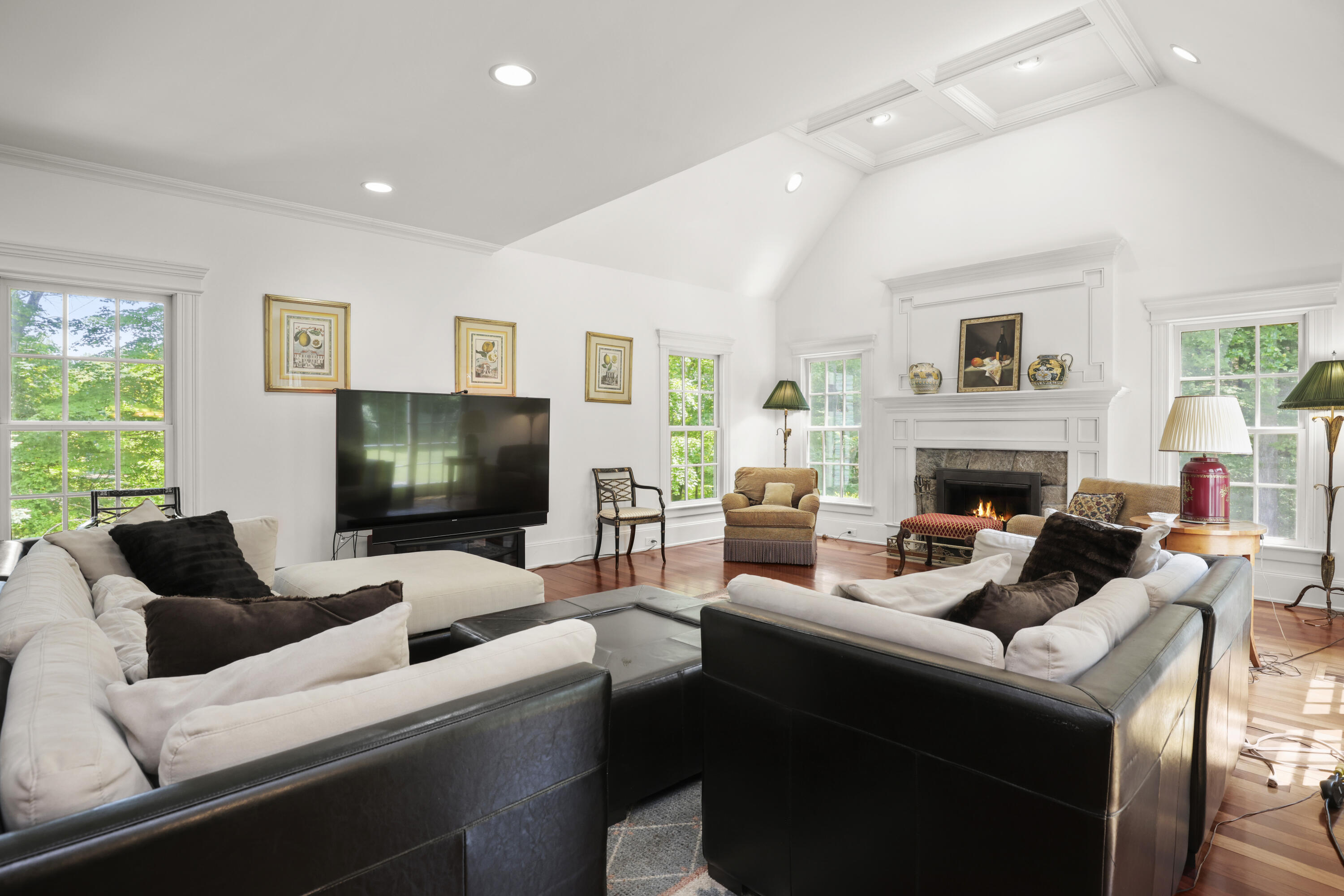 218 Limestone Road Ridgefield, CT 06877 - Photo 16 of 41 a living room with furniture and a flat screen tv