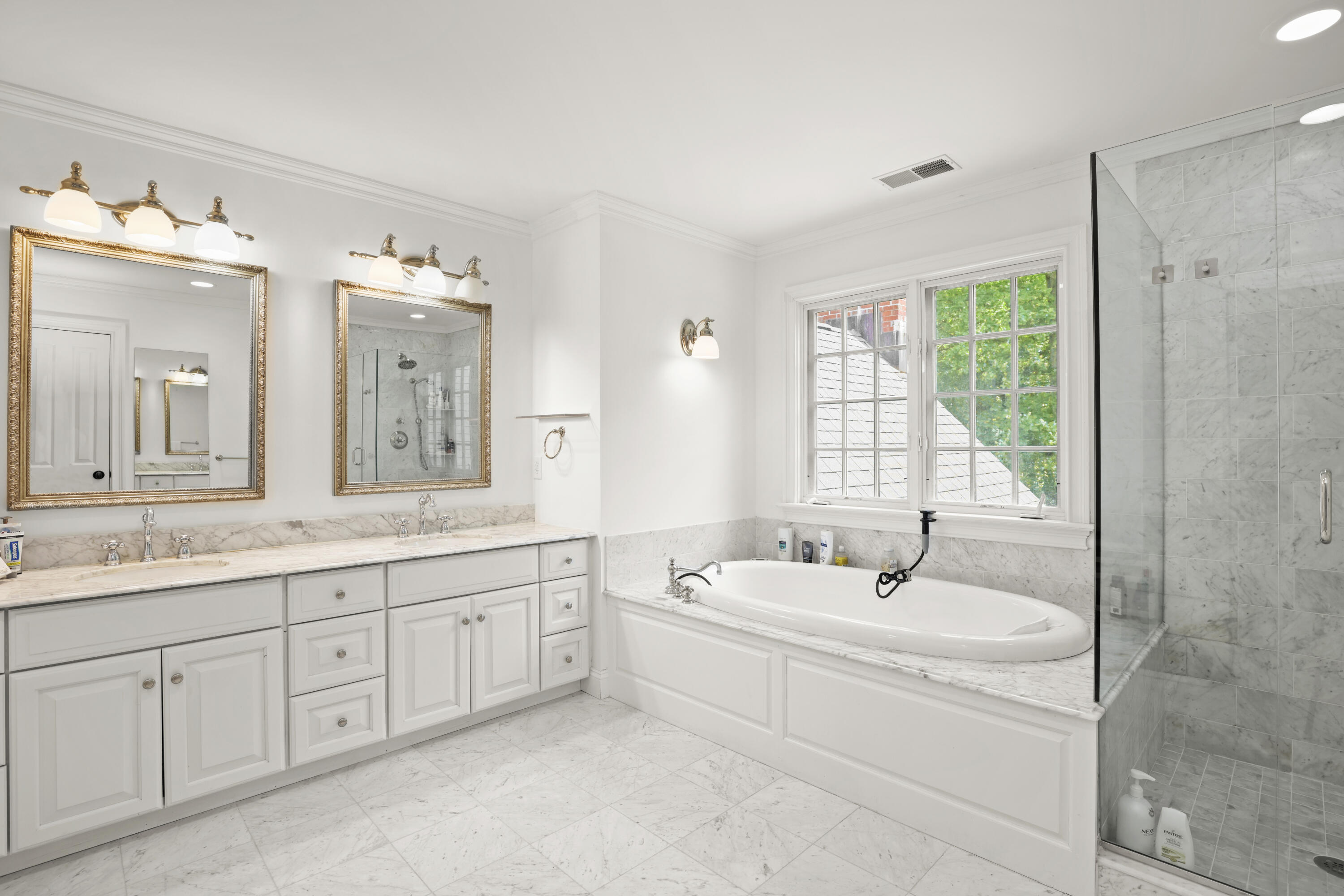 218 Limestone Road Ridgefield, CT 06877 - Photo 30 of 41 a bathroom with a double vanity sink mirror and next to a window