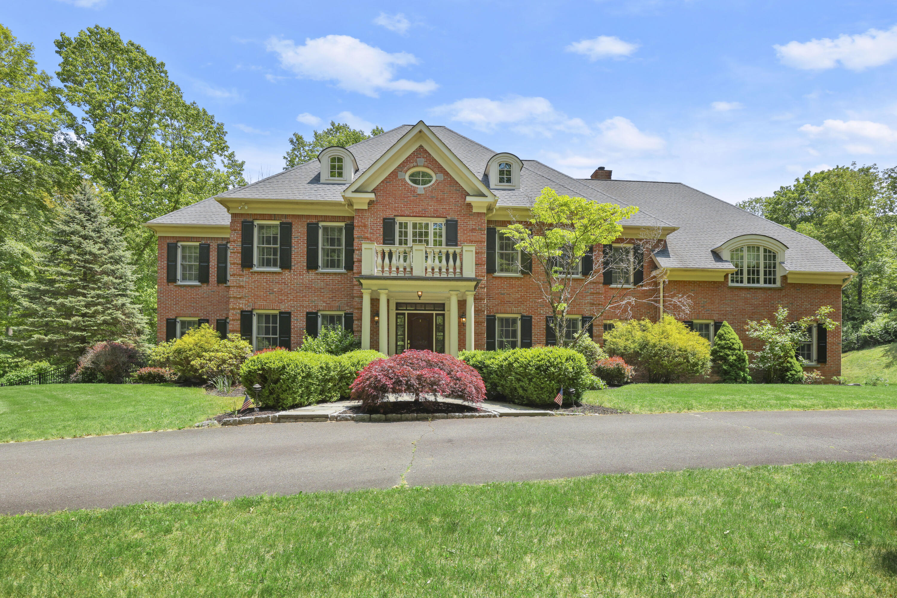 218 Limestone Road Ridgefield, CT 06877 - Photo 4 of 41 a front view of a house with garden