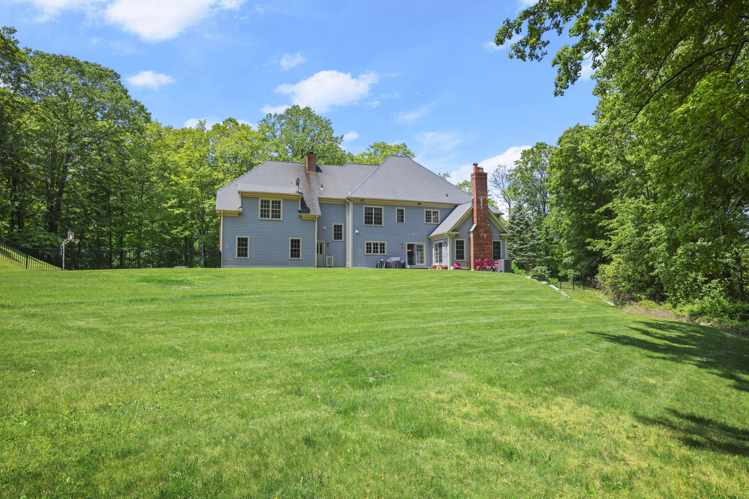 218 Limestone Road Ridgefield, CT 06877 - Photo 7 of 41 a house view with a garden space