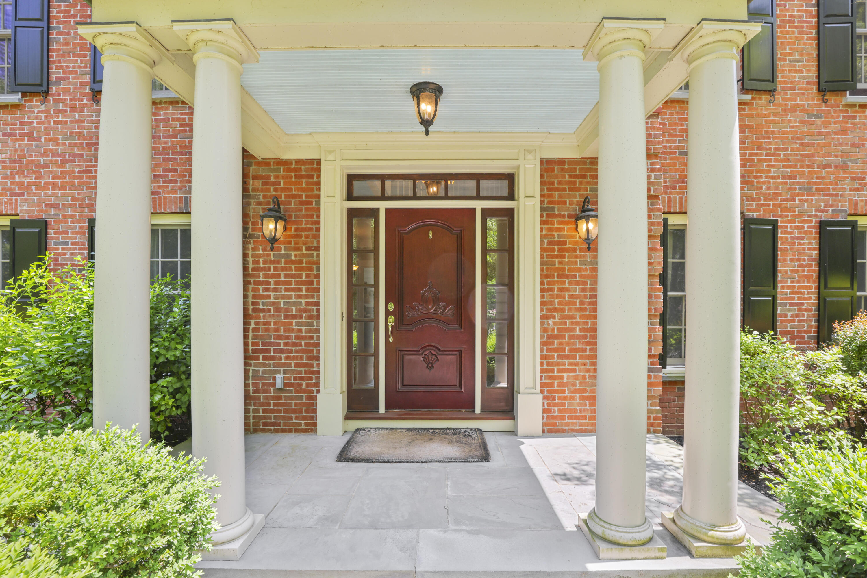 218 Limestone Road Ridgefield, CT 06877 - Photo 8 of 41 a front view of a house with a shower