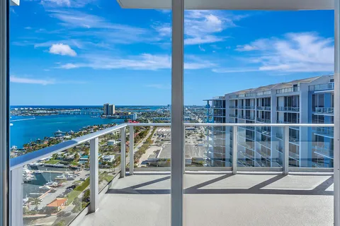 a view of a balcony with city view