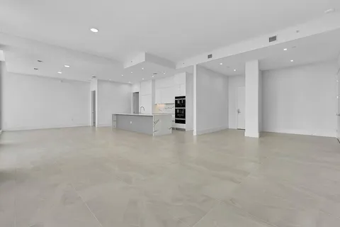 an empty room with a natural light