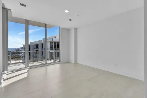 a view of an empty room with a sliding door