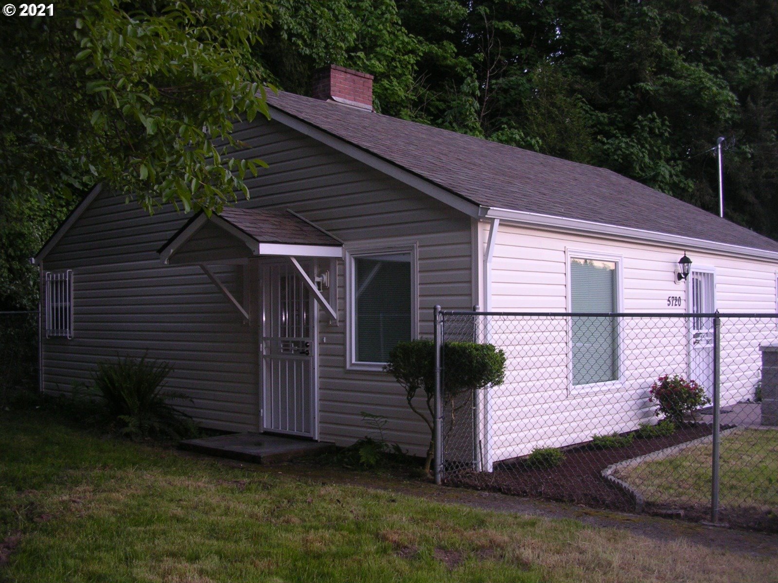 5720 Southeast Jenne Road Portland, OR 97236 - Photo 2 of 23 a view of a house with a yard