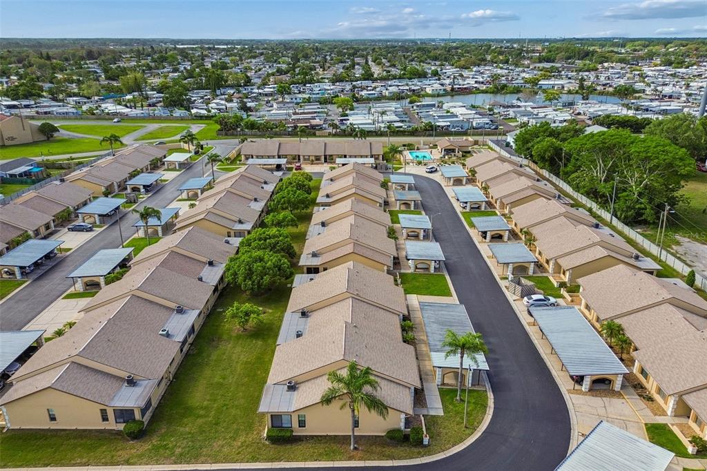 4753 Sunny Loop Holiday, FL 34690 - Photo 33 of 39 a view of a city with lawn chairs