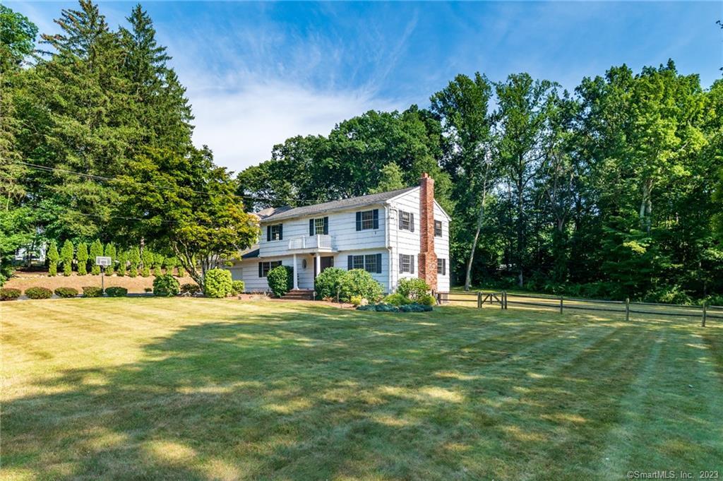 24 Macdonald Road Trumbull, CT 06611 - Photo 1 of 1 a front view of a house with a yard