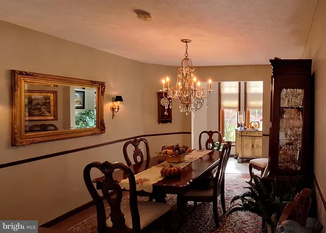 a kitchen with a sink stove and microwave
