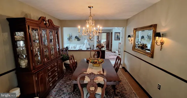 a kitchen with stainless steel appliances granite countertop a refrigerator and a stove