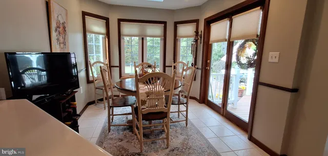 a kitchen with a sink and a refrigerator