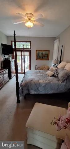 a view of staircase with a rug