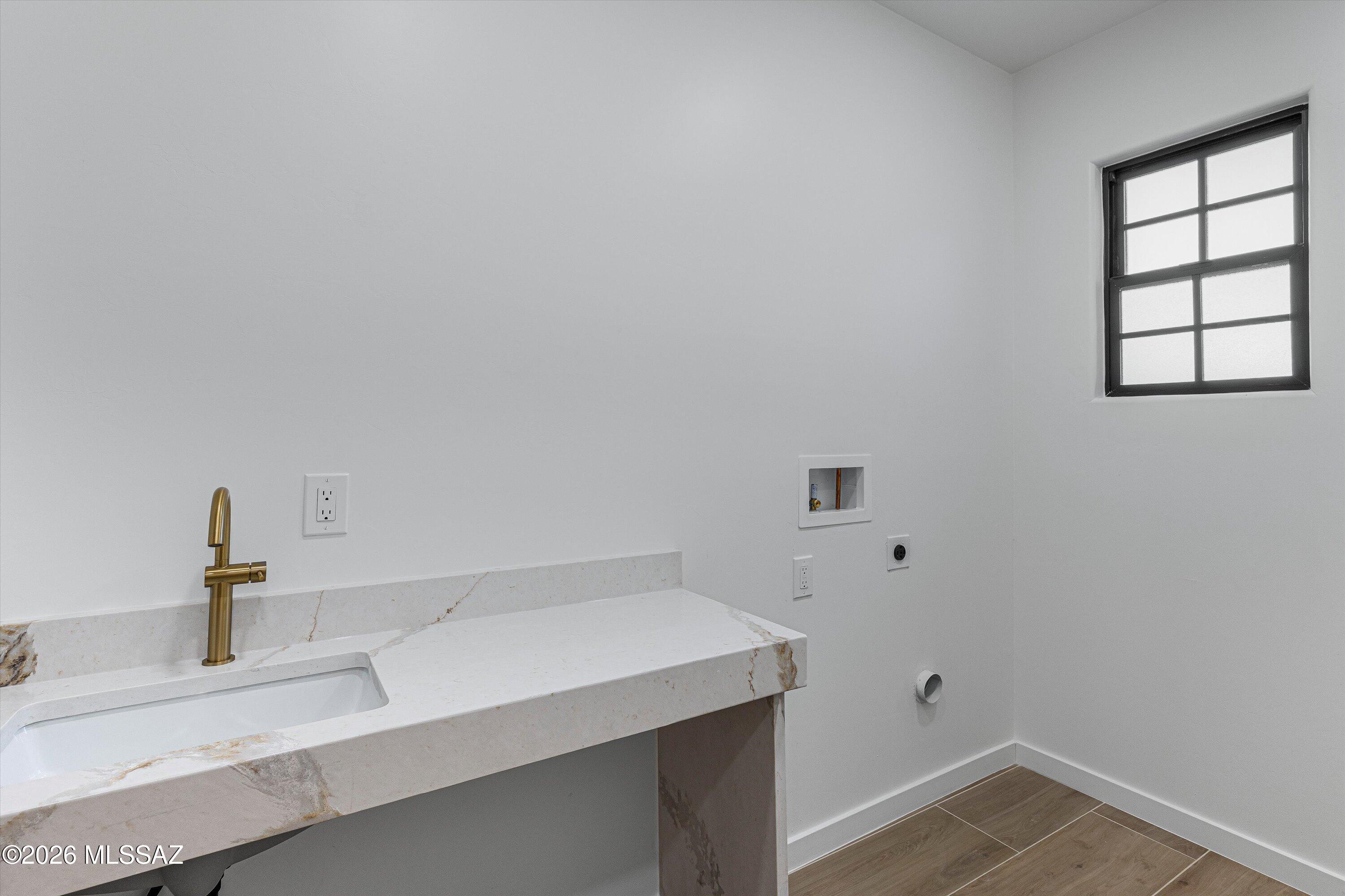 5259 East Fort Lowell Road Tucson, AZ 85712 - Photo 29 of 50 a bathroom with a sink and a vanity