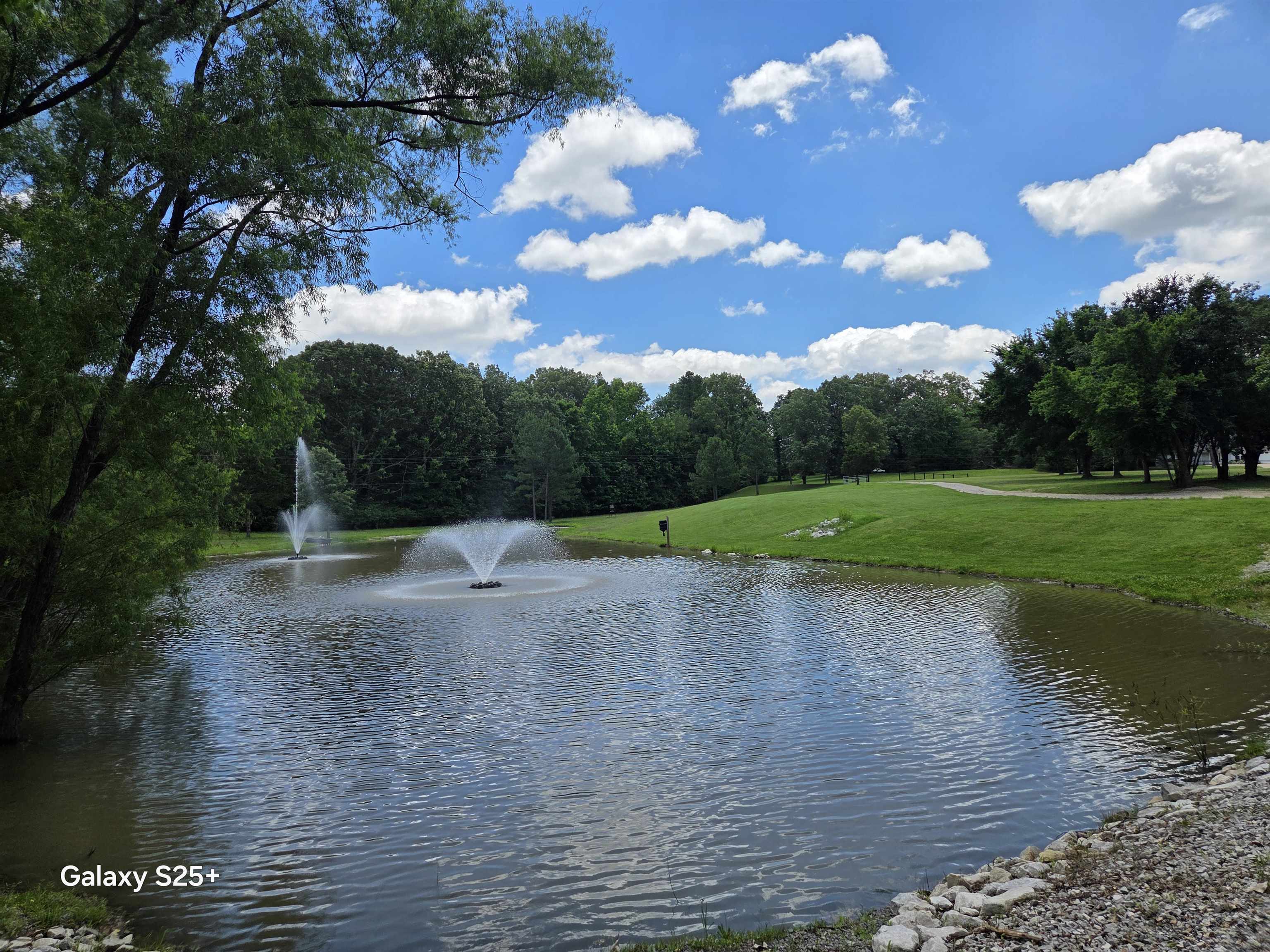 a view of a lake with outdoor space