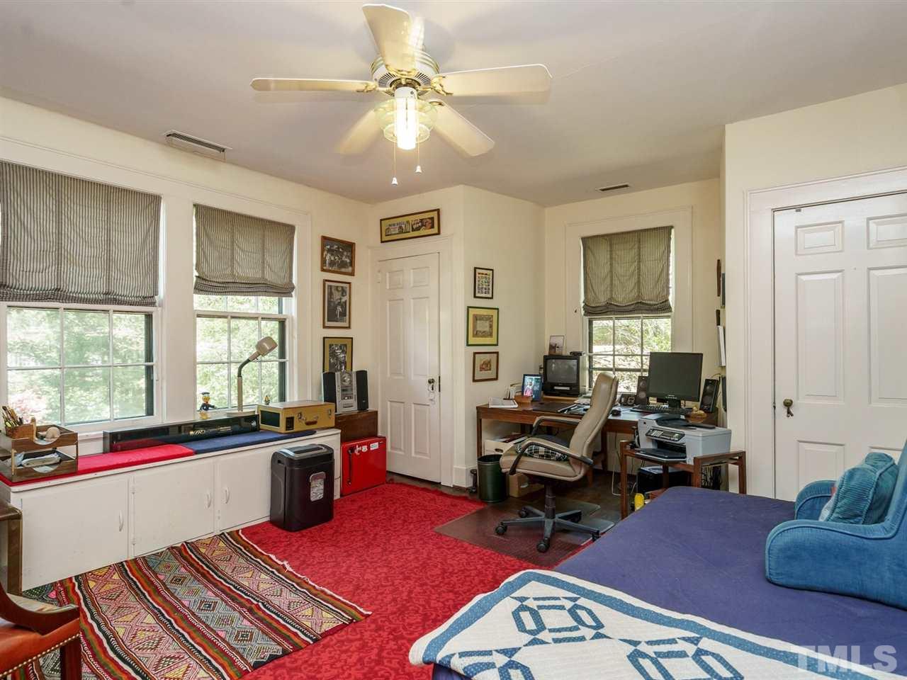2004 Stone Street Raleigh, NC 27608 - Photo 14 of 23 a room with furniture or couch and a window