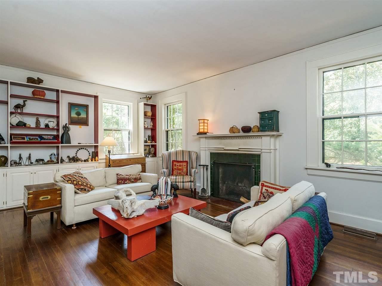2004 Stone Street Raleigh, NC 27608 - Photo 3 of 23 a living room with furniture fireplace and window