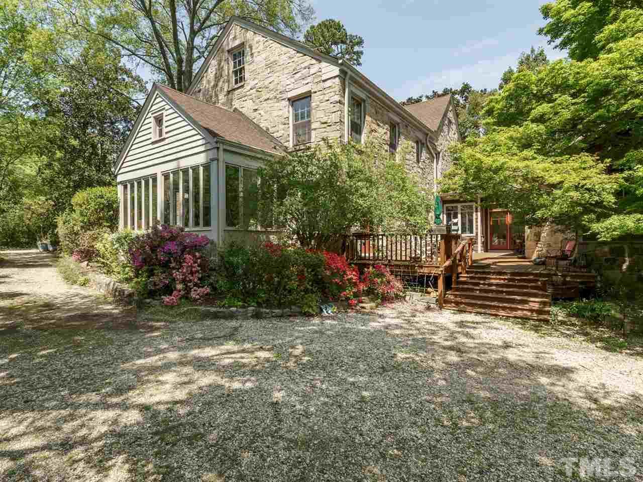2004 Stone Street Raleigh, NC 27608 - Photo 21 of 23 a view of a house with a yard