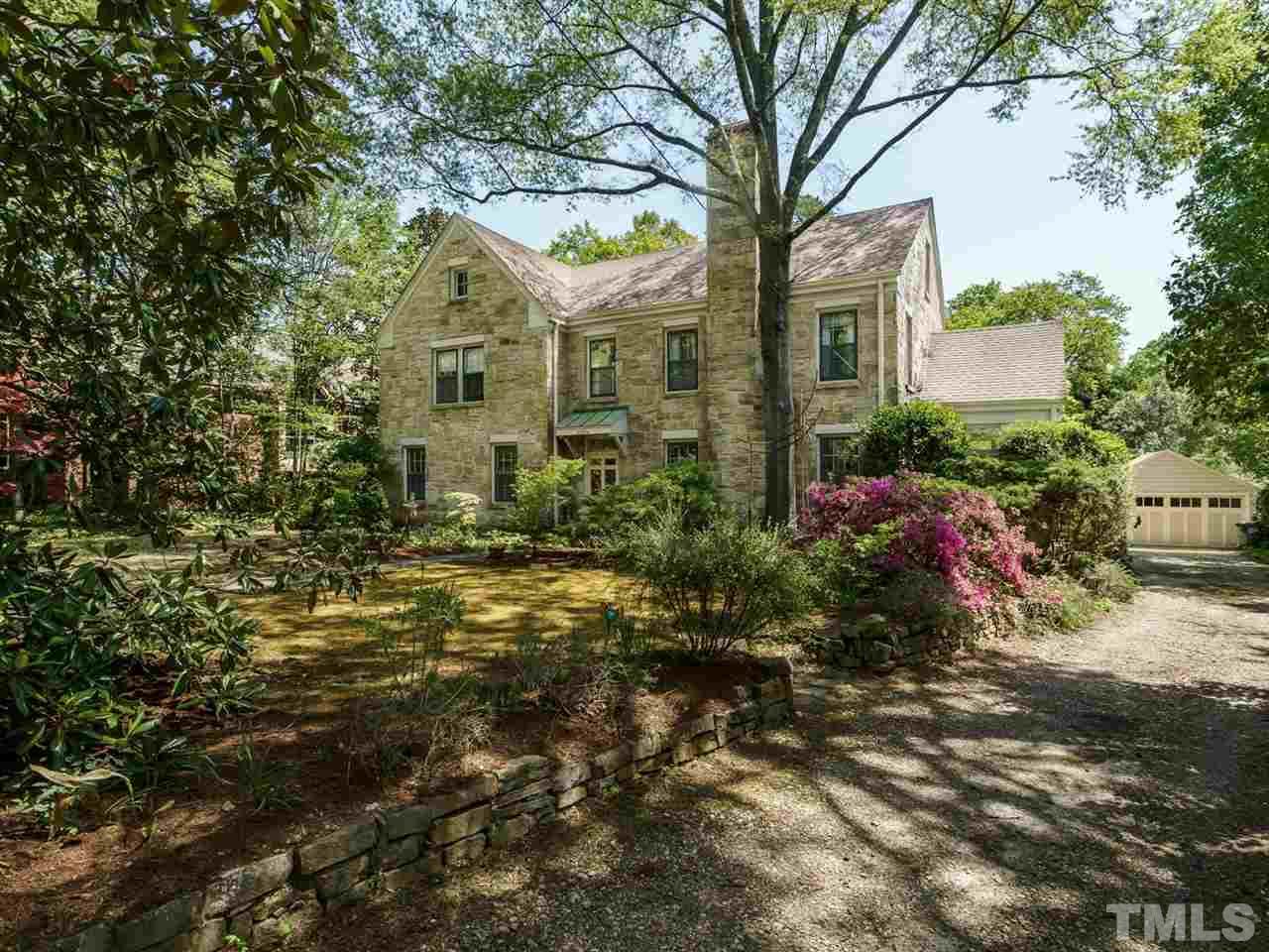 2004 Stone Street Raleigh, NC 27608 - Photo 23 of 23 a front view of a house with a yard