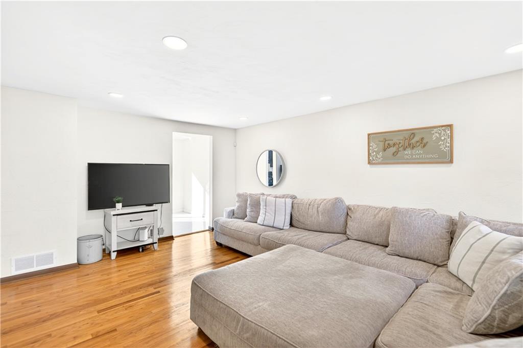 224 Salem Church Road Rostraver Township, PA 15012 - Photo 19 of 48 a living room with furniture and a flat screen tv
