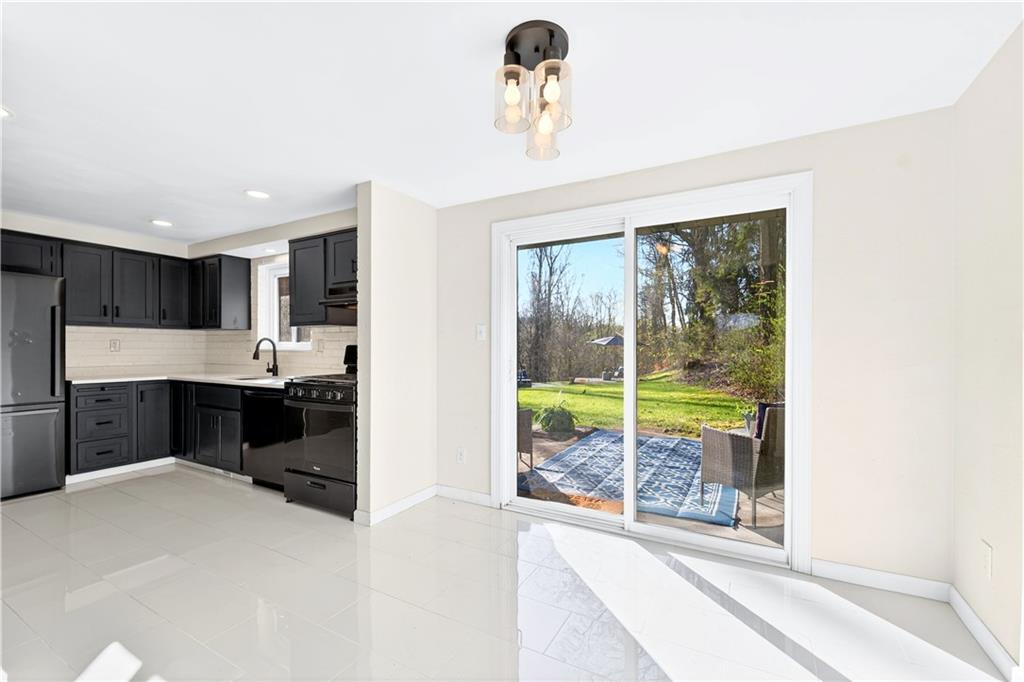 224 Salem Church Road Rostraver Township, PA 15012 - Photo 20 of 48 a large white kitchen with a large window