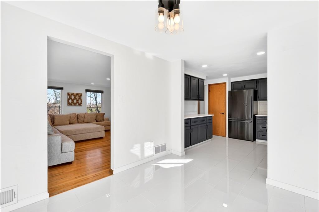 224 Salem Church Road Rostraver Township, PA 15012 - Photo 21 of 48 a living room with furniture and a kitchen