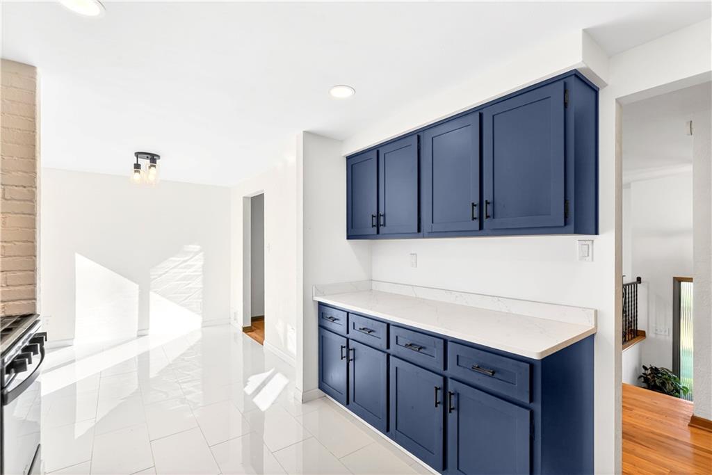 224 Salem Church Road Rostraver Township, PA 15012 - Photo 26 of 48 a kitchen with wooden cabinets and sink