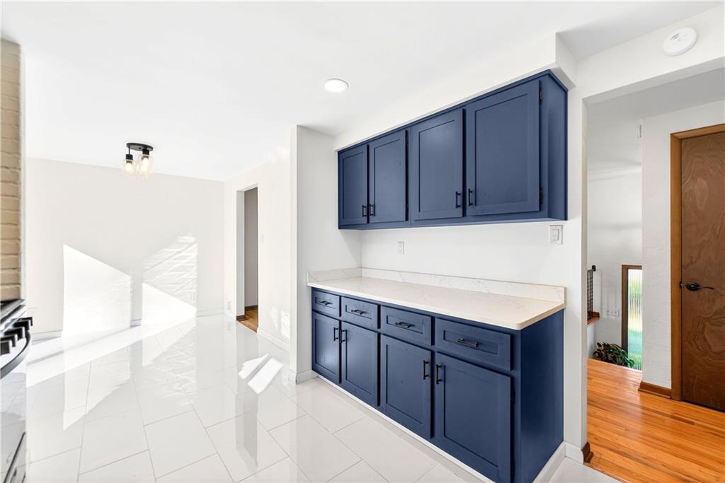224 Salem Church Road Rostraver Township, PA 15012 - Photo 28 of 48 a kitchen with a sink and cabinets