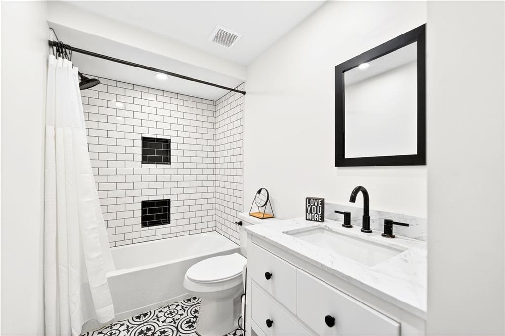 224 Salem Church Road Rostraver Township, PA 15012 - Photo 29 of 48 a bathroom with a sink a toilet and a mirror